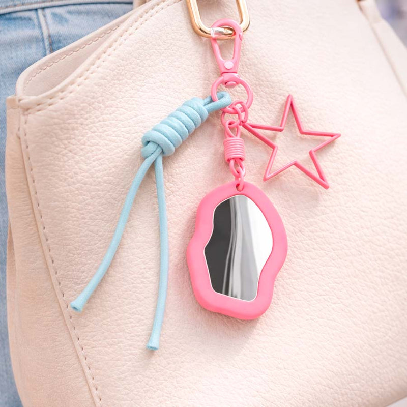 Charm colgante soporte espejo enganchado a bolso